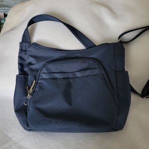 Traveling navy nylon purse